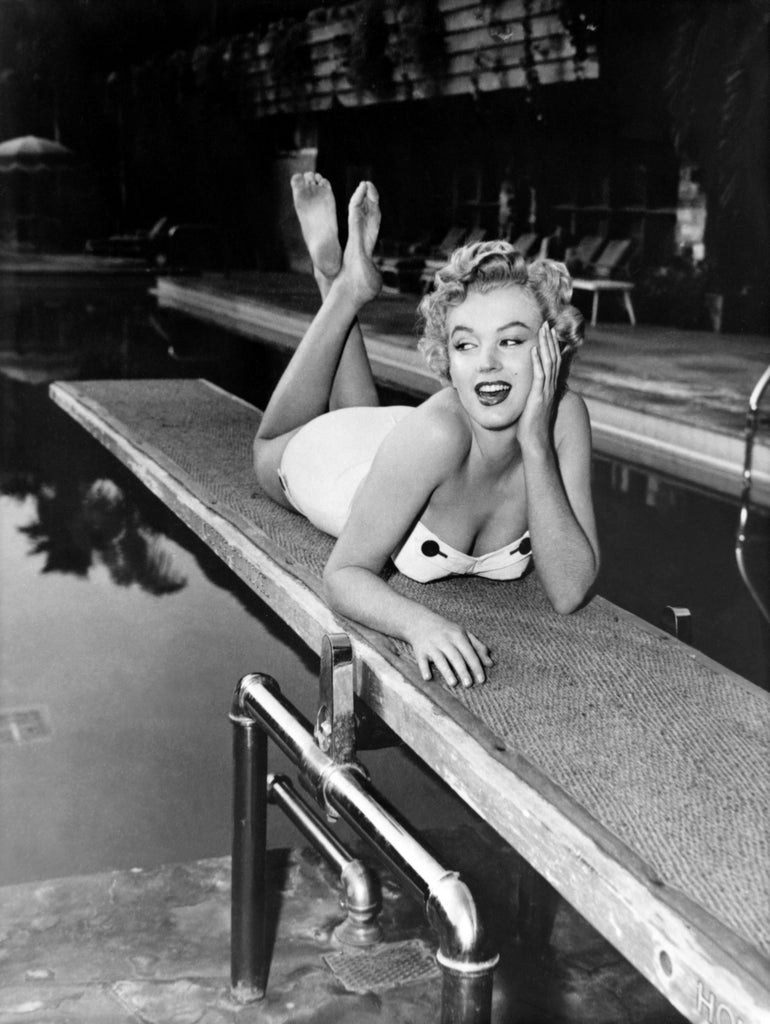 Marilyn Monroe lying on a springboard in California, 1953 by Bridgeman Images on GIANT ART - black and white photography