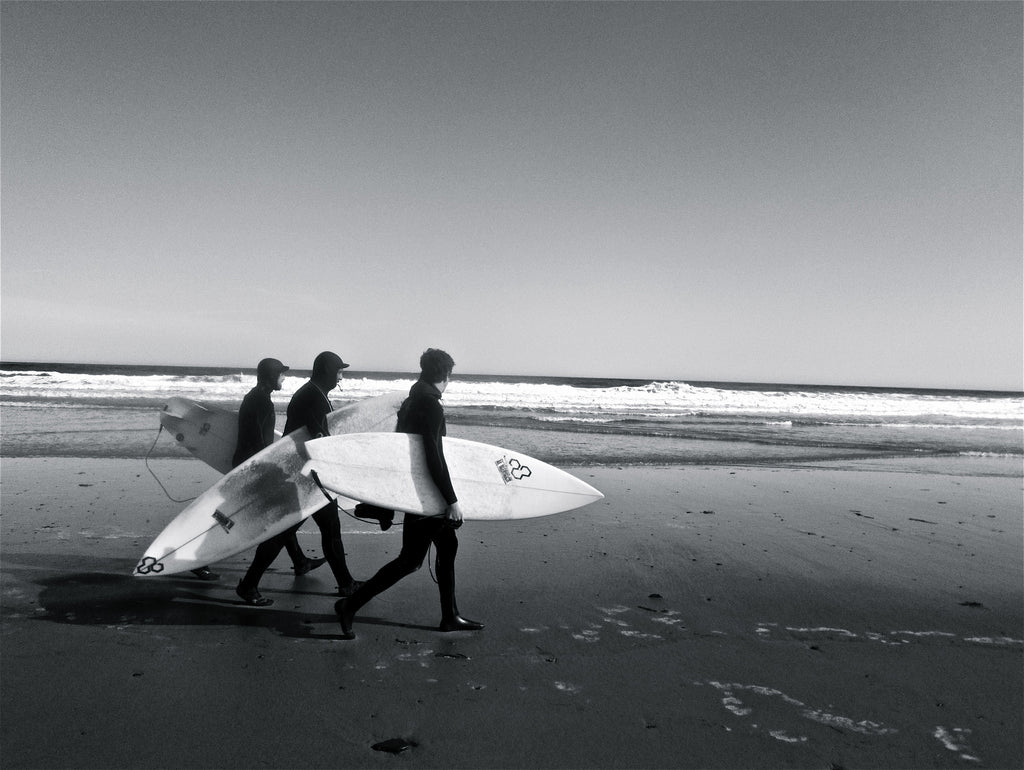 Surfers by Pauline Aubut on GIANT ART - white coastal  sand